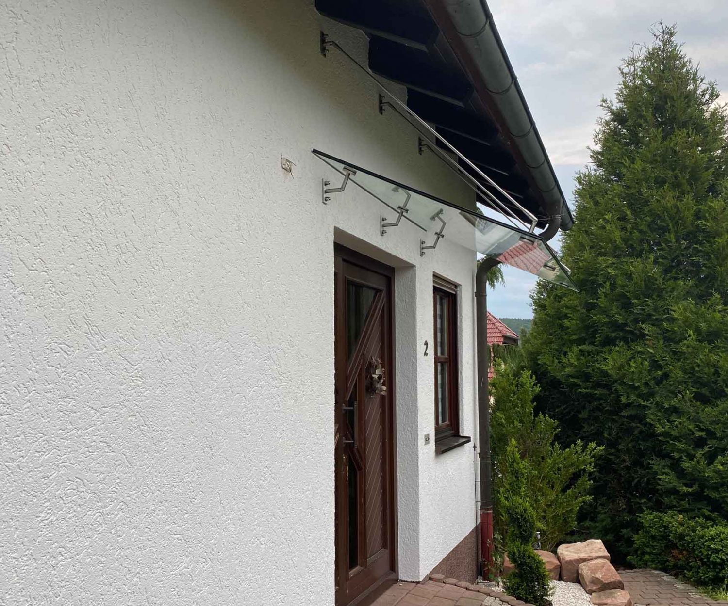 Abgehangenes Vordach Klarglas